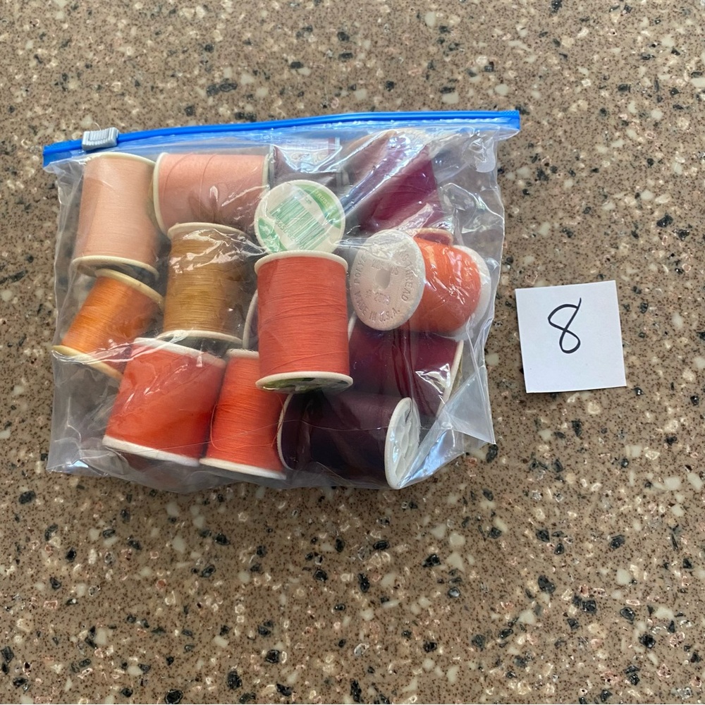 13 Spools of Sewing Thread in Fall Colors